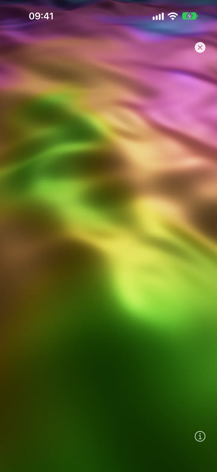 The Silk visualizer, soft folds of green, yellow and pink.